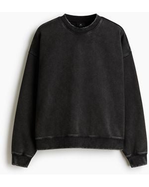 H&M Sweatshirt im Washed-Look in Oversized Fit - Schwarz
