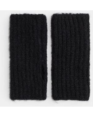 H&M Flauschige Pulswärmer - Schwarz