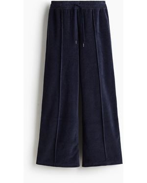 H&M Weite Joggpants aus Velours - Blau