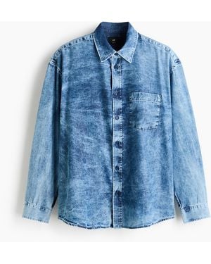 H&M Ausgewaschenes Jeanshemd in Relaxed Fit - Blau