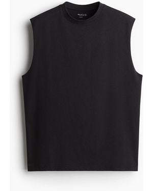 H&M Sport-Tanktop in Loose Fit - Schwarz