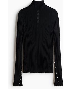 H&M Geripptes Shirt mit Zierknöpfen - Schwarz