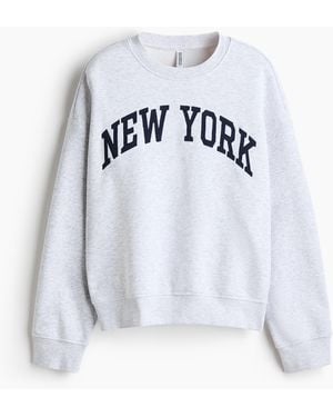 H&M Oversized Sweatshirt mit Print - Weiß