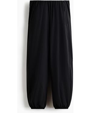 H&M Wärmende Sporthose mit Balloon Leg - Schwarz