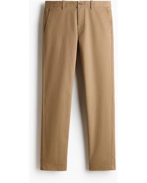 H&M Baumwollchino in Slim Fit - Natur