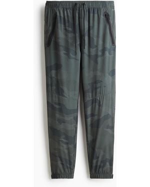 H&M Sport-Joggpants mit DryMoveTM in Regular Fit - Grau