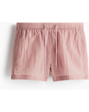 H&M Badeshorts aus gecrinkeltem Nylon - Pink