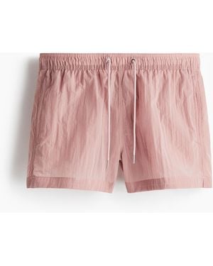 H&M Badeshorts aus gecrinkeltem Nylon - Pink