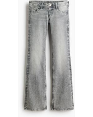 H&M Flared Ultra Low Waist Jeans - Grau