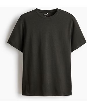 H&M Cooling T-Shirt in Regular Fit - Schwarz
