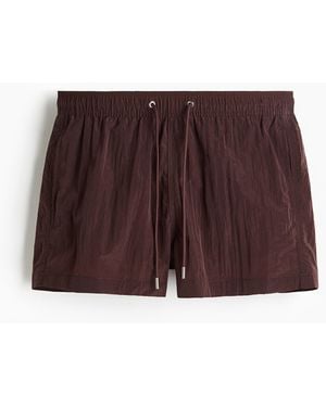 H&M Badeshorts aus gecrinkeltem Nylon - Braun