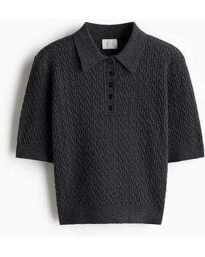 H&M Poloshirt in Zopfstrick - Schwarz