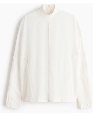 H&M Geripptes Shirt mit Fledermausärmeln - Weiß