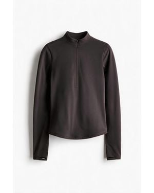 H&M Wärmendes Sportshirt mit Fleece SoftMove - Schwarz