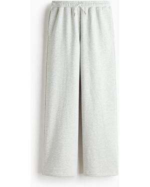 H&M Sport-Joggpants in Oversized Fit - Weiß