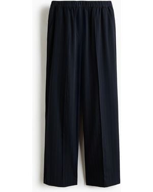 H&M Schlupfhose in Loose Fit - Schwarz