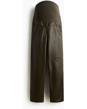 H&M MAMA Hose mit Coating - Grün