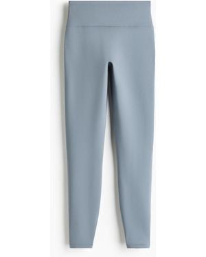 H&M Wärmende Sportleggings mit Fleece SoftMove - Blau