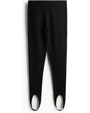 H&M Leggings mit Fusssteg - Schwarz