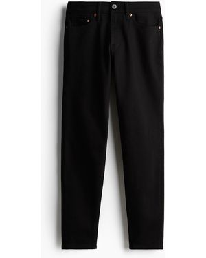 H&M Regular Tapered Jeans - Schwarz