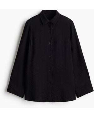 H&M Crinklebluse aus Viskosegemisch - Schwarz
