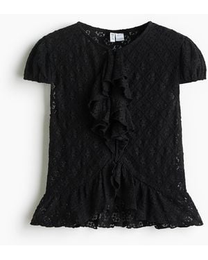 H&M Spitzenshirt mit Volantsaum - Schwarz