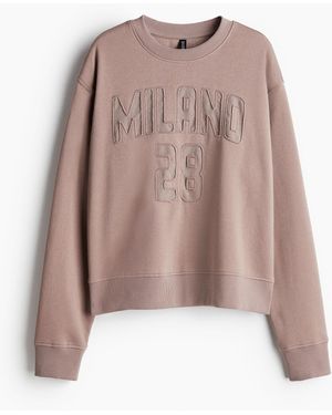 H&M Oversized Sweatshirt mit Frontmotiv - Mehrfarbig