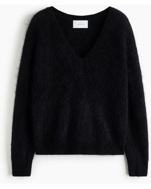H&M Wollpullover mit V-Ausschnitt - Schwarz