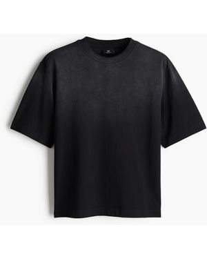 H&M Bedrucktes T-Shirt in Oversized Fit - Schwarz