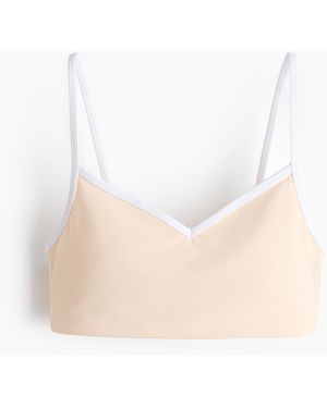 H&M Sport-BH mit SoftMoveTM Medium Support - Weiß