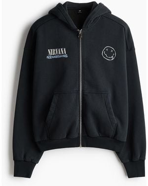 H&M Bedruckte Hoodiejacke in Oversized Fit - Schwarz
