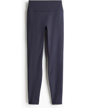 H&M Wärmende Sportleggings mit Fleece SoftMove - Blau