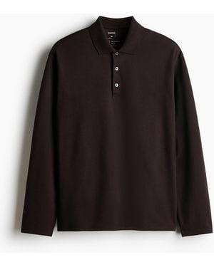H&M Cooling Poloshirt mit Langarm in Regular Fit - Schwarz