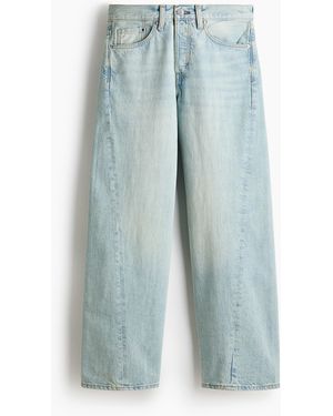 H&M Loose Straight Jeans mit Twisted Leg - Blau
