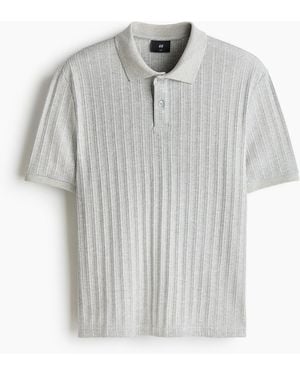 H&M Poloshirt aus Strukturjersey in Slim Fit - Grau