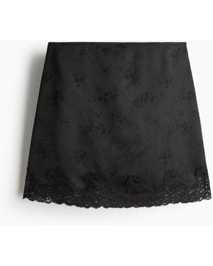 H&M Jupe mit Spitzenbesatz - Schwarz