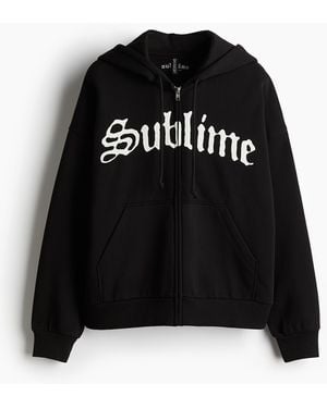 H&M Oversized Hoodiejacke mit Motivdetail - Schwarz
