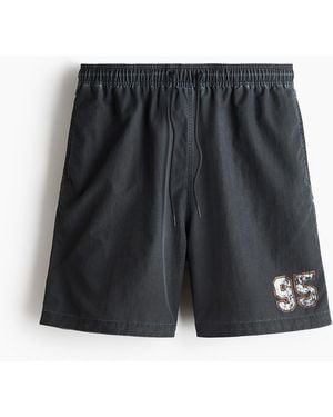 H&M Lange Badeshorts - Schwarz