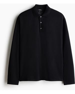 H&M Cooling Poloshirt mit Langarm in Regular Fit - Schwarz