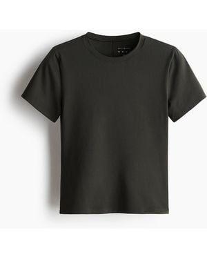 H&M Leichtes Yogashirt mit SoftMove - Schwarz