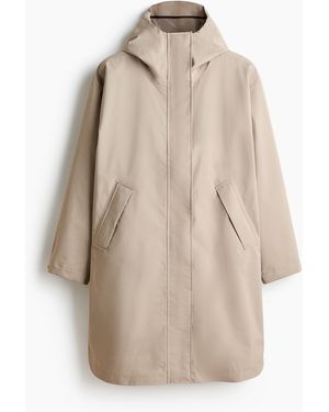 H&M Regenmantel mit StormMove in Loose Fit - Natur