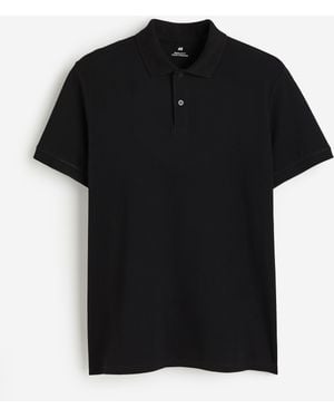 H&M Pikeeshirt in Regular Fit - Schwarz