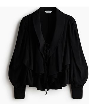 H&M Bluse mit Schalkragen und Peplum - Schwarz