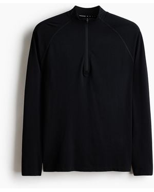 H&M Muscle Fit Sportshirt mit Zipper und DryMove - Schwarz