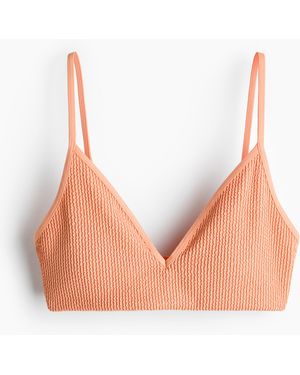 H&M Wattiertes Bikinitop - Orange