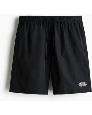 H&M Lange Badeshorts - Schwarz