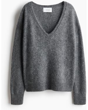 H&M Wollpullover mit V-Ausschnitt - Grau