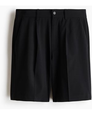 H&M Four-way Stretch Loose Fit Shorts - Zwart