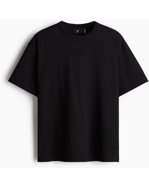 H&M COOLMAX® T-Shirt Loose Fit - Schwarz