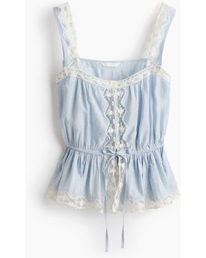 H&M Peplumtop mit Spitzenbesätzen - Blau